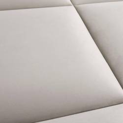 mur capitonné beige