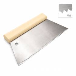 Peigne à colle V6 robuste et précis pour une répartition homogène de la colle et une adhérence optimale, au mur comme au sol.