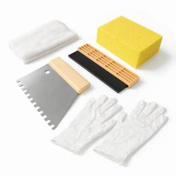 Kit clés en main pour la pose de carrelage en sachet refermable.